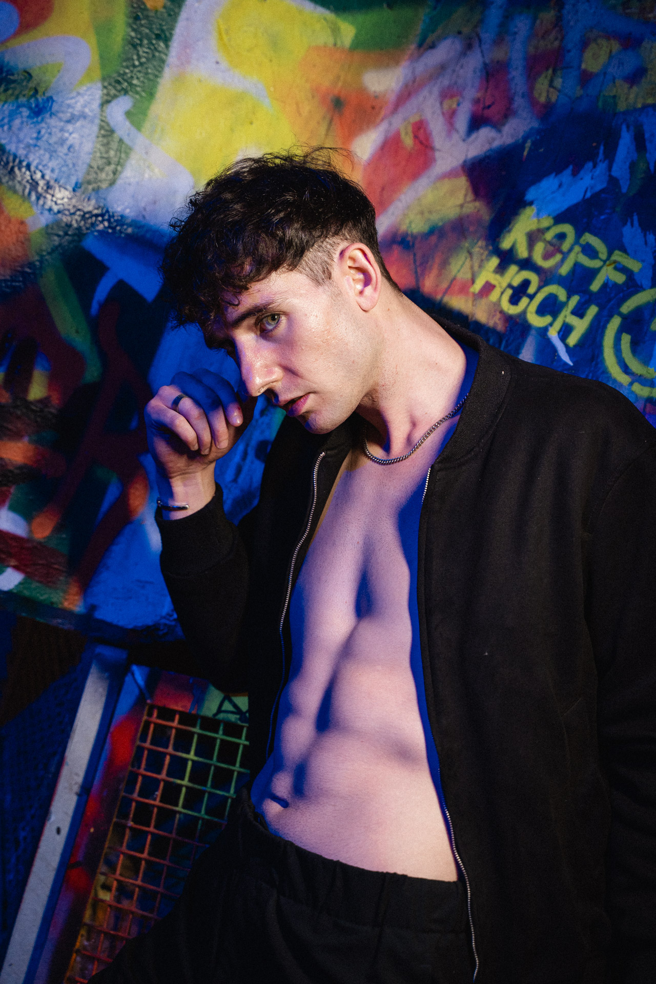 Location — blue graffiti wall